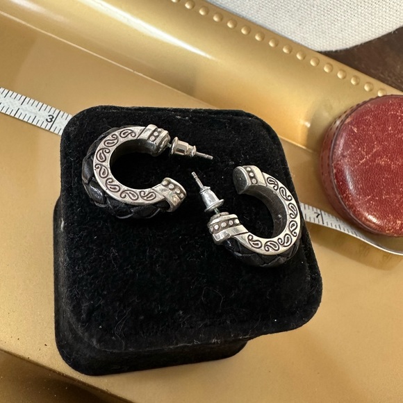 Minimalist silvertone earrings with braided leather design - Picture 2 of 5